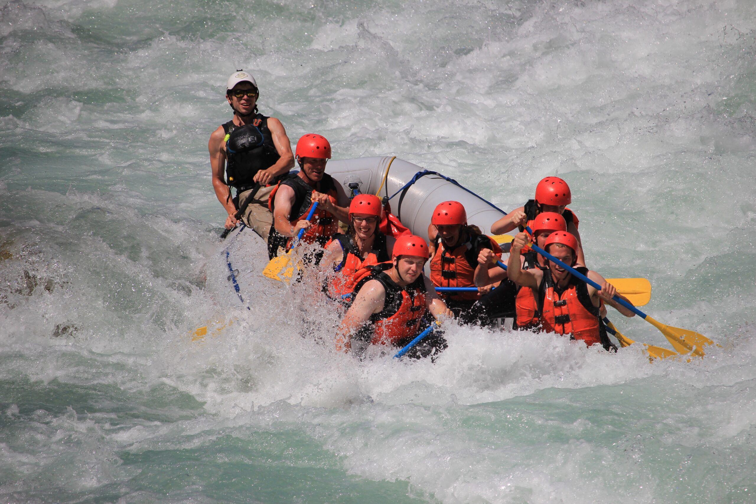 Group rafting in a Canyon whitewater river in Fernie BC